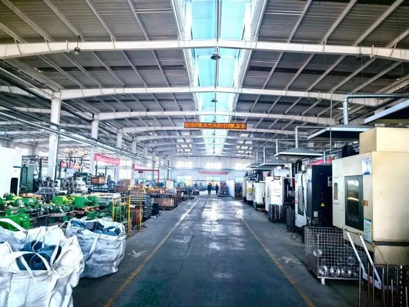 Workshop interior with agricultural machinery and assembly areas